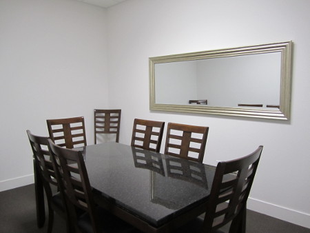 courthouse-suites-on-main-8-person-meeting-room-450x338